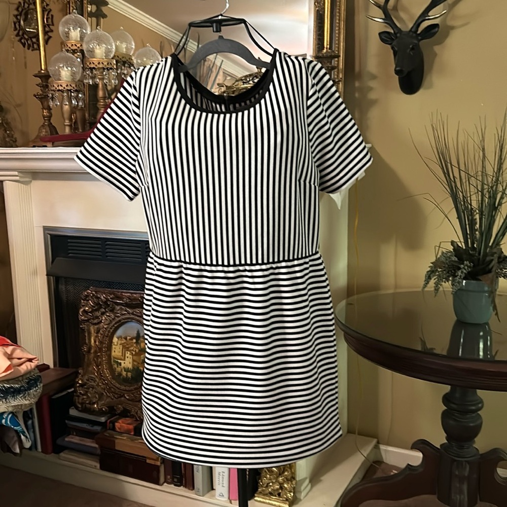 Black and white striped dress zips in the back